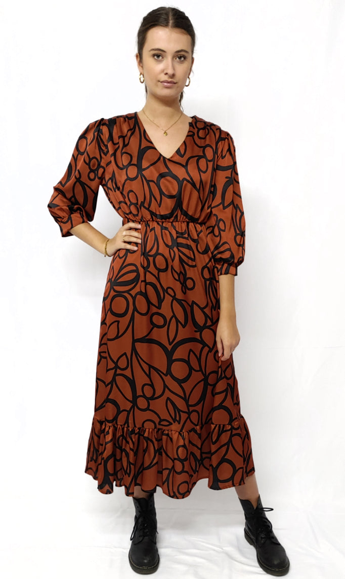 Dress rust color with pattern